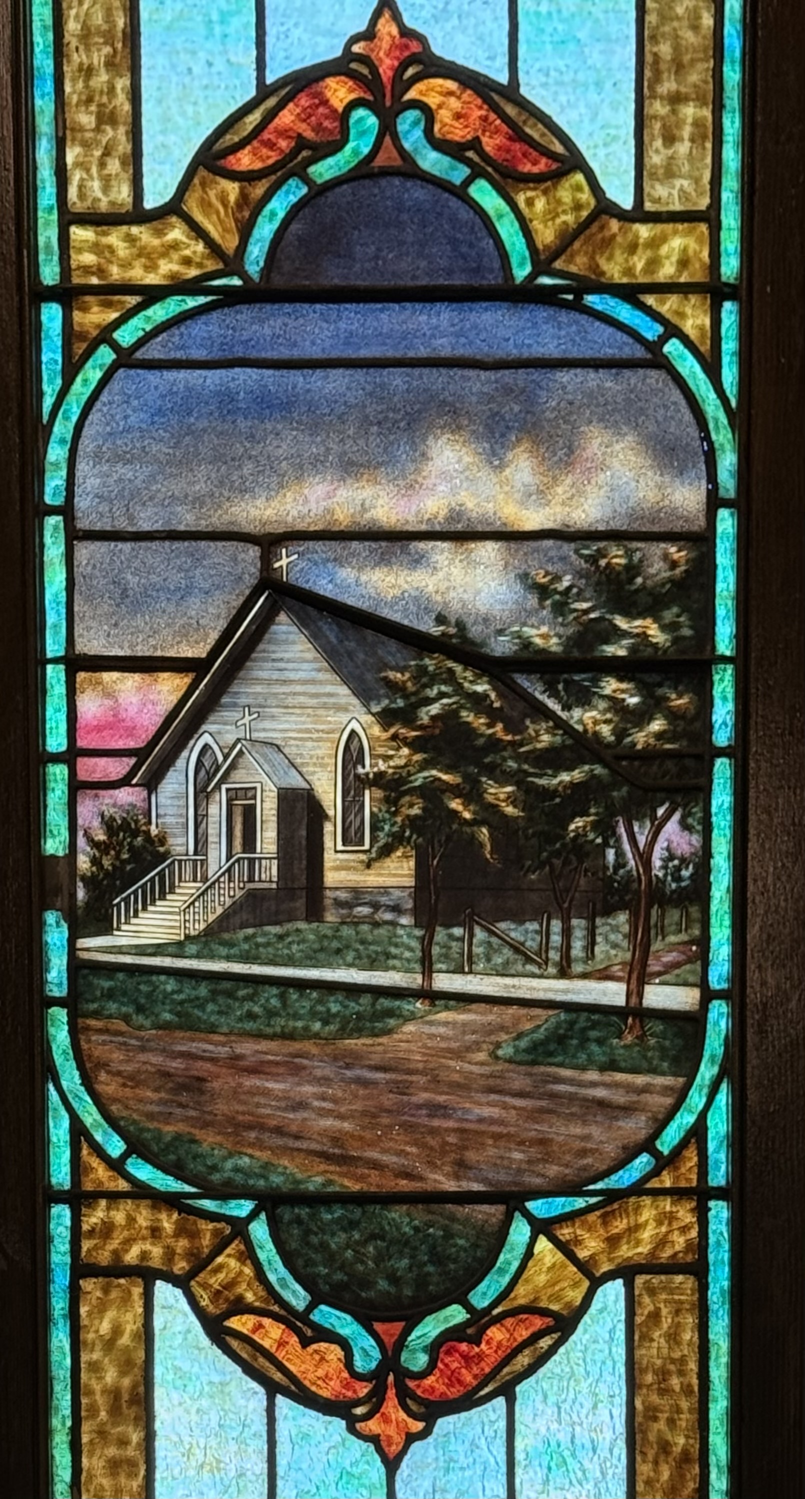 Stained glass window of the second church of St. Edward