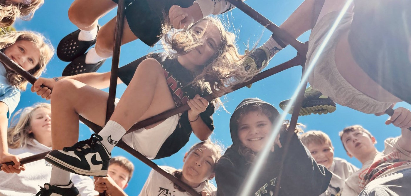 Elementary students on the jungle gym.