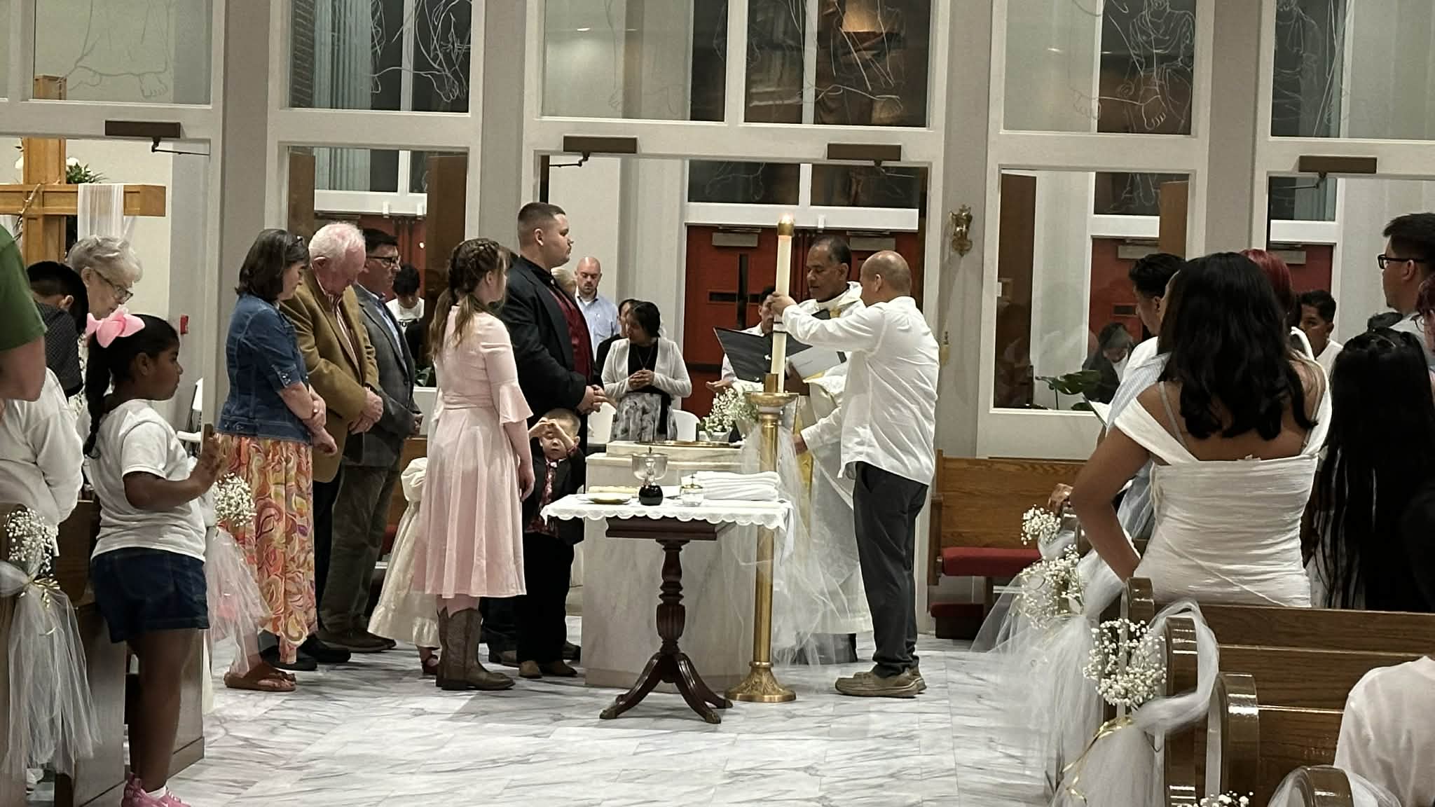 Baptismal rite begins
