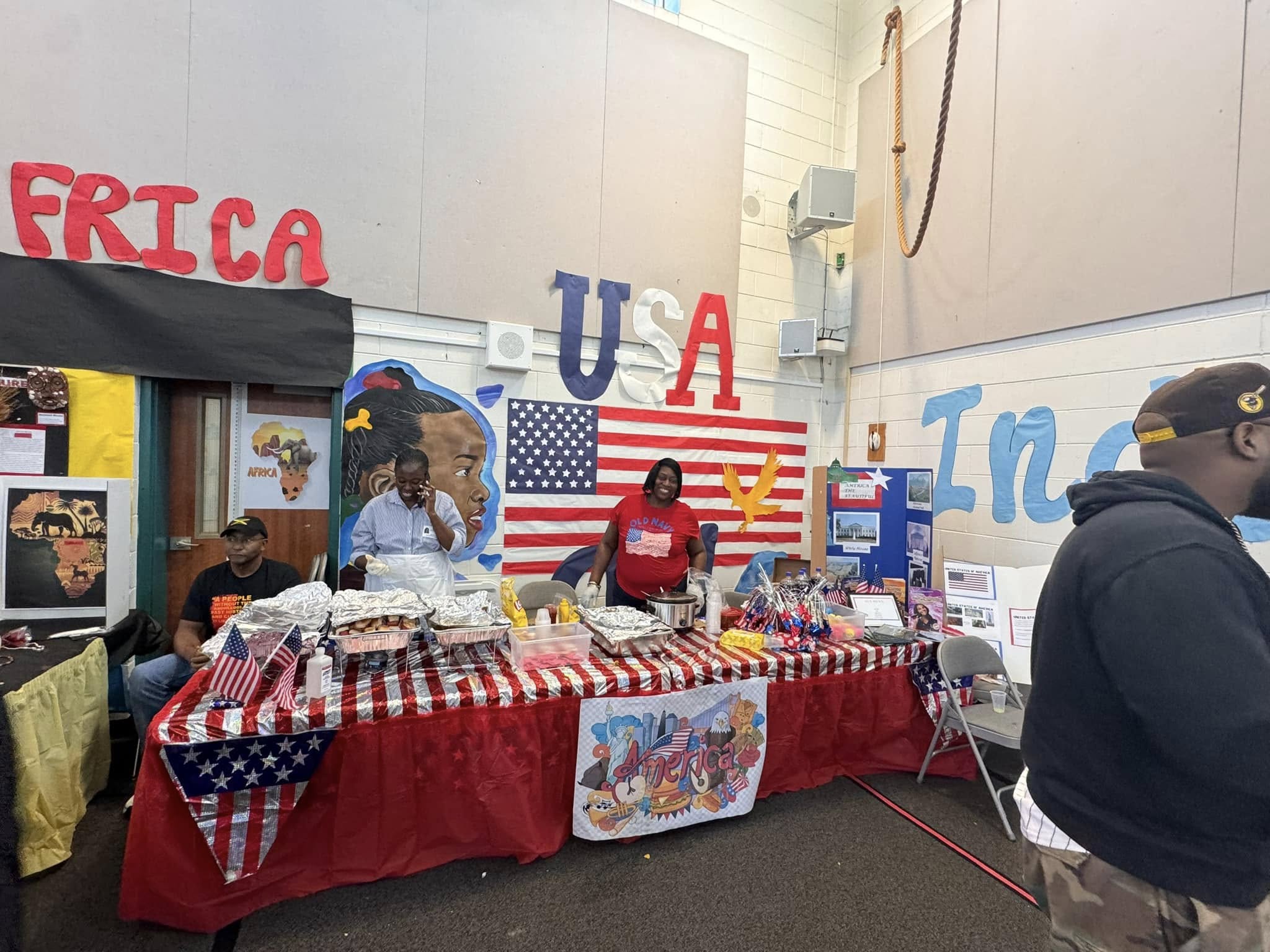 FRICA USA IND setup of multicultural festival in a room