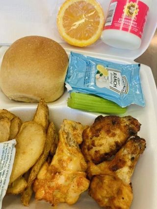 Hot Wings, Potat Wedges, Celery Sticks with Ranch Dressing, Whole Grain Roll, Orange and Fat Free Strawberry Milk