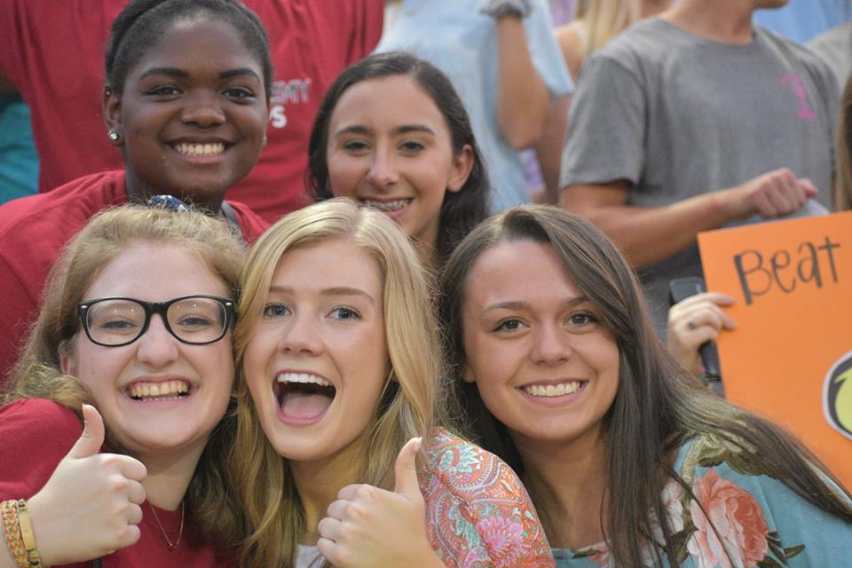 group of students thumbs up