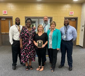 Assistant Superintendent Lesa Brown, Vidalia City School Teacher of the Year Julie Spivey, Superintendent Dr. Sandy Reid. Back - SDM Assistant Principals Michael Johnson & Ben Helms and SDM Principal Brandon Boston