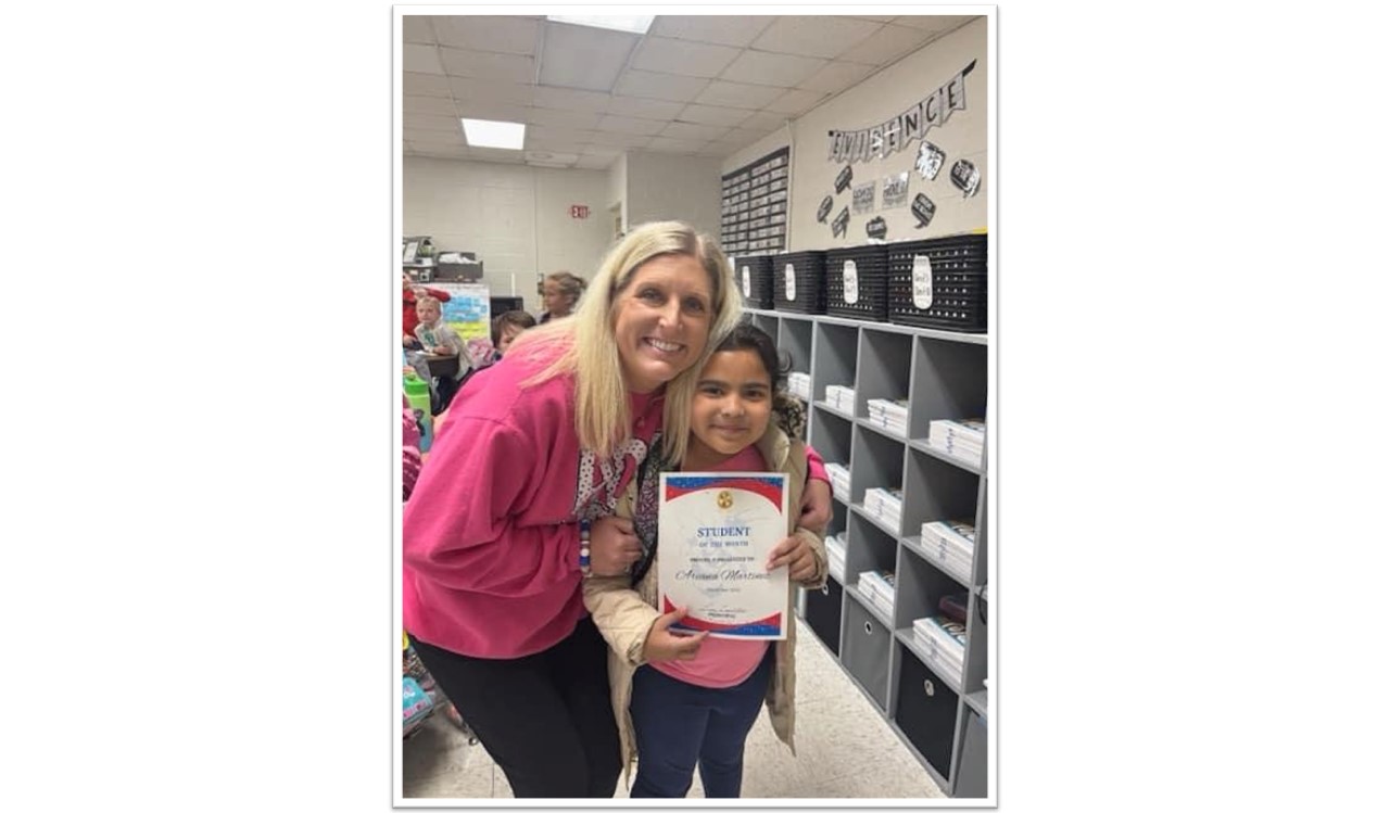 Ariana Martinez, elementary Student of the Month for November, is pictured with her assistant principal!