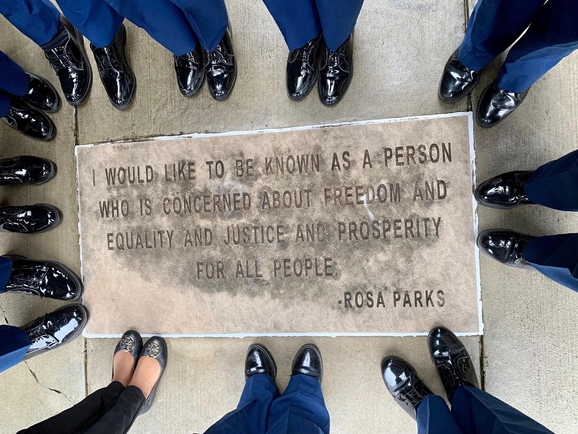 Murphy and Blount JROTC cadets demonstrate how footsteps of our present meet those of our past with a Rosa Parks Memorial quote on Dexter Avenue in Montgomery, Alabama.