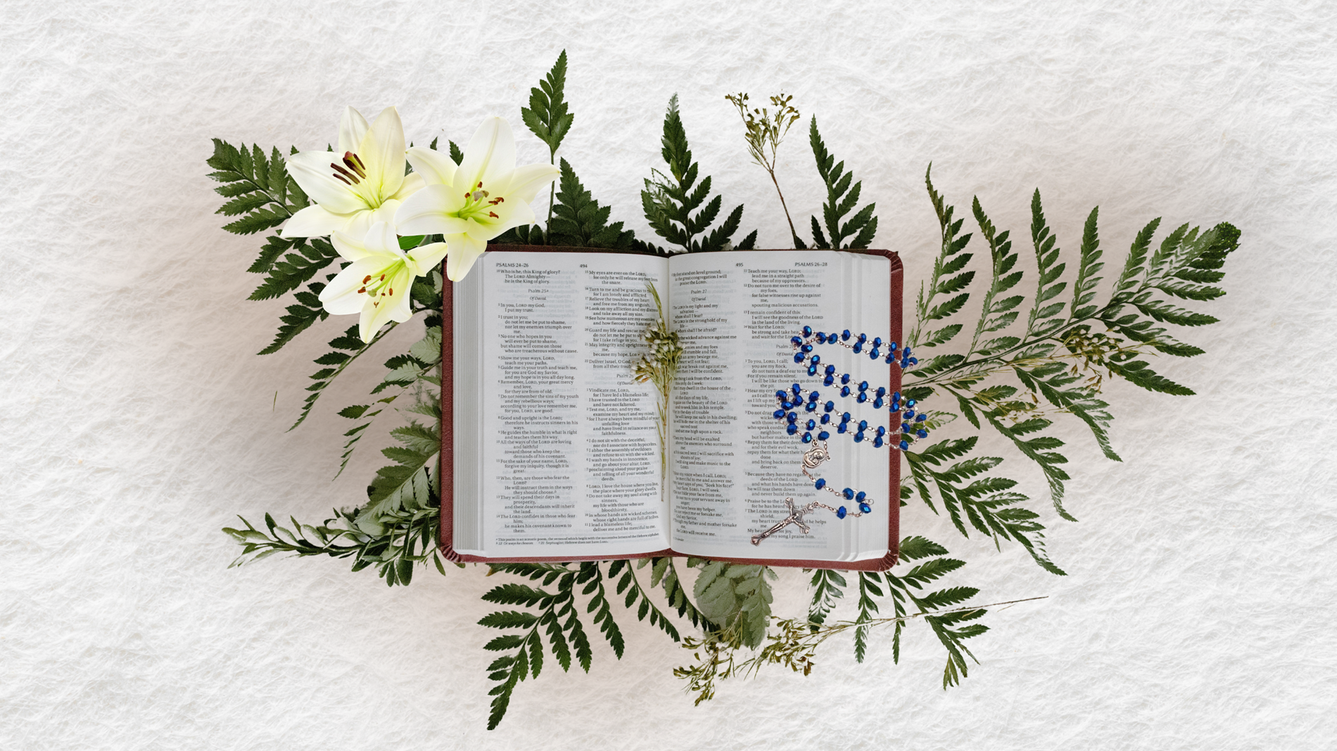 Bible with blue rosary Bible with blue rosary