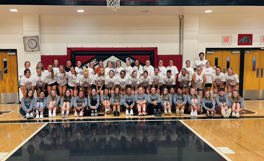 HCHS Alumni Volleyball game picture of current team with alumni