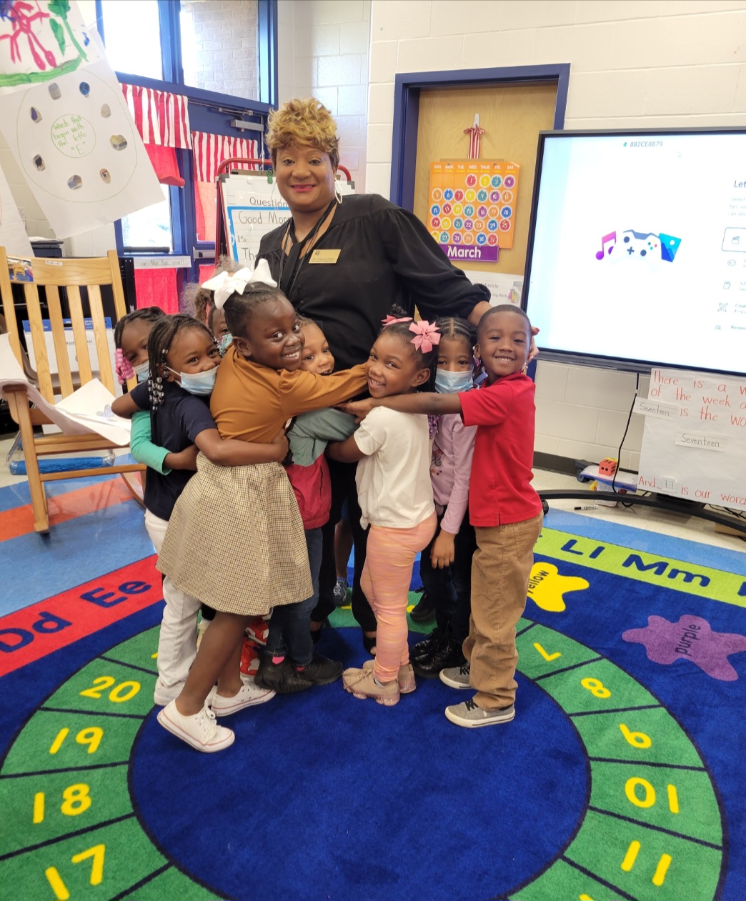 Mrs. Hadley with Pre-K students.