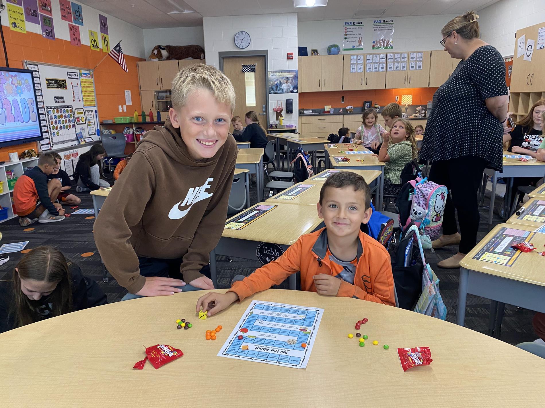 A 6th grader and 1st grader working together