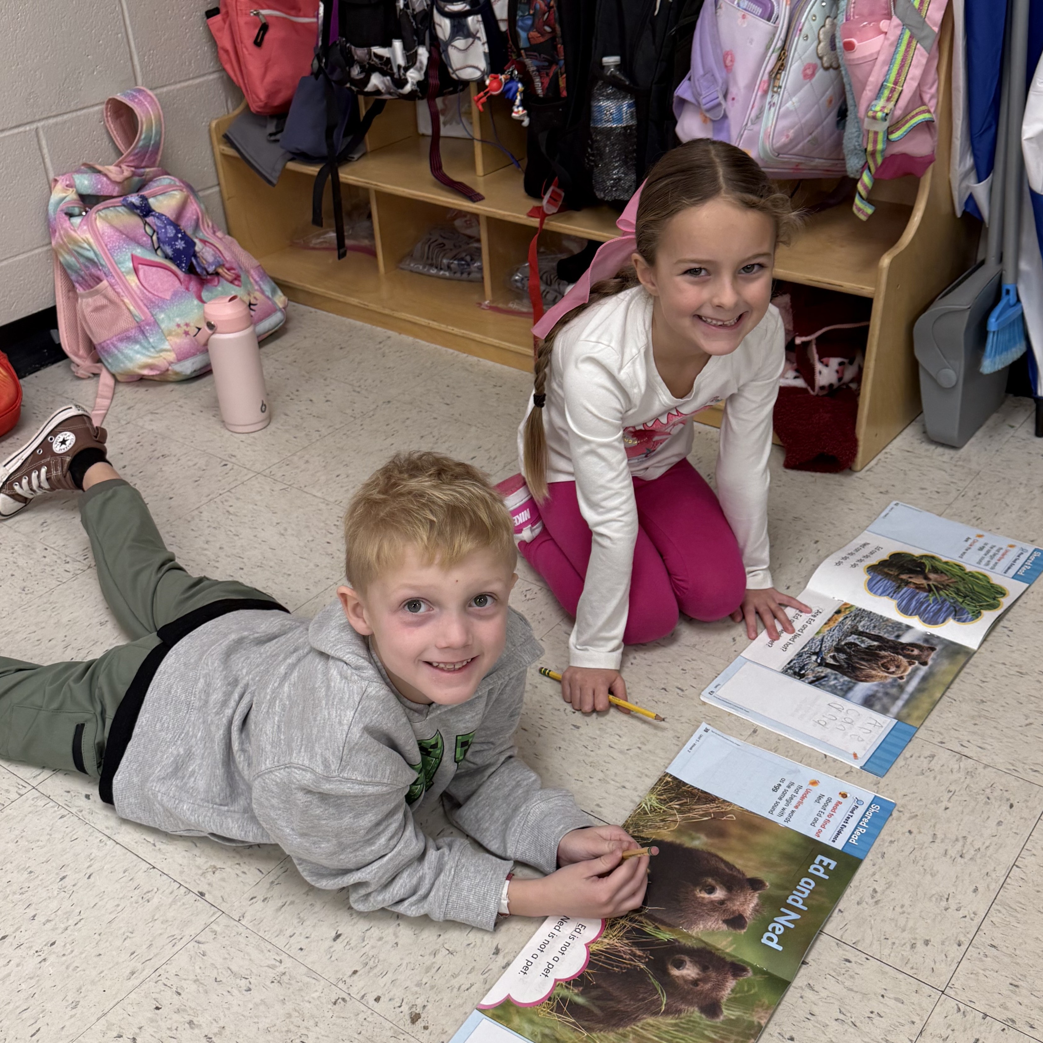 Two friends reading together 