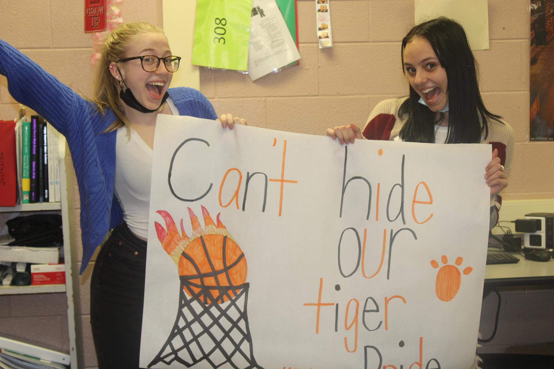 Students holding spirit sign