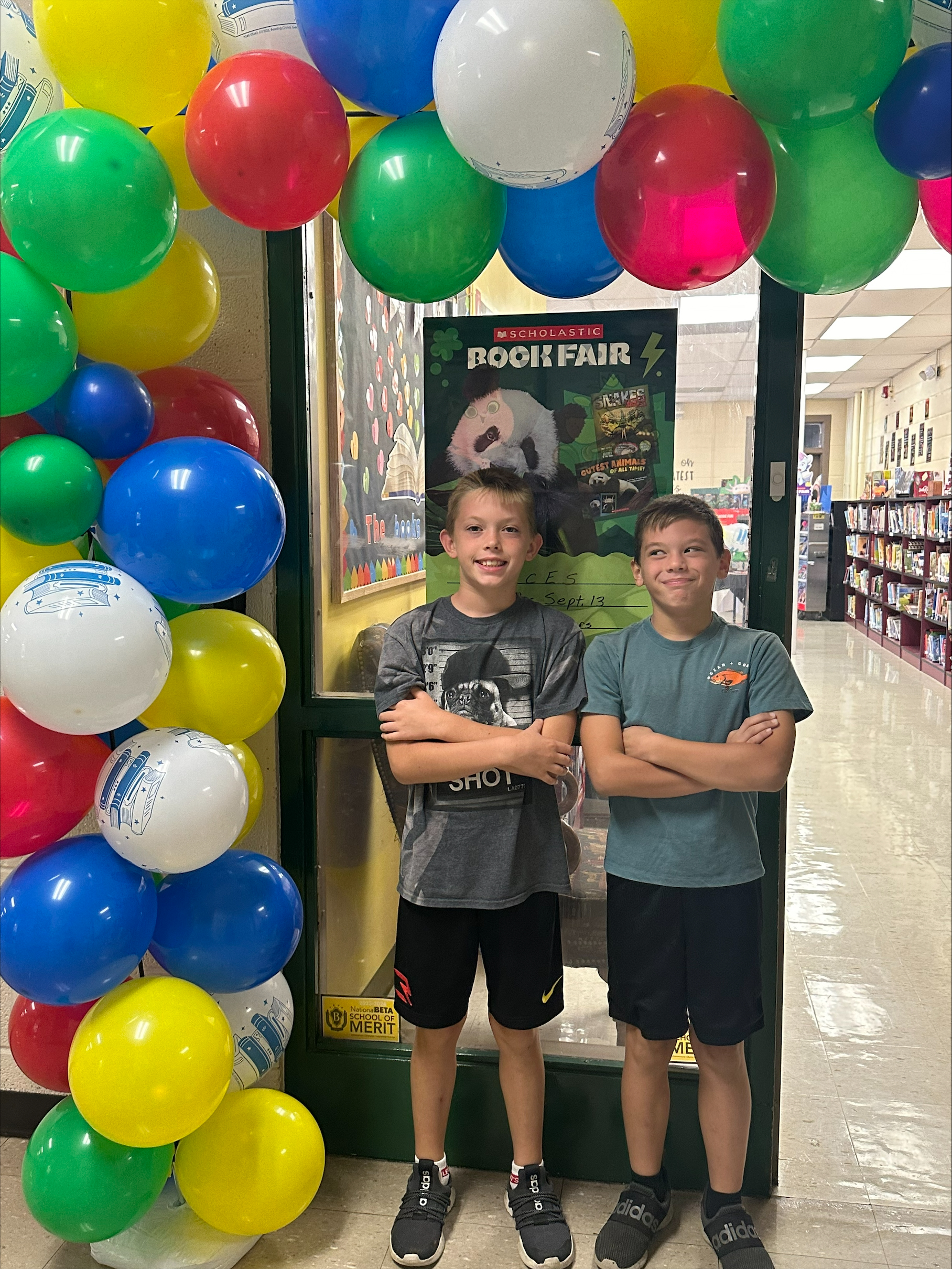 students stand outside of wces book fair