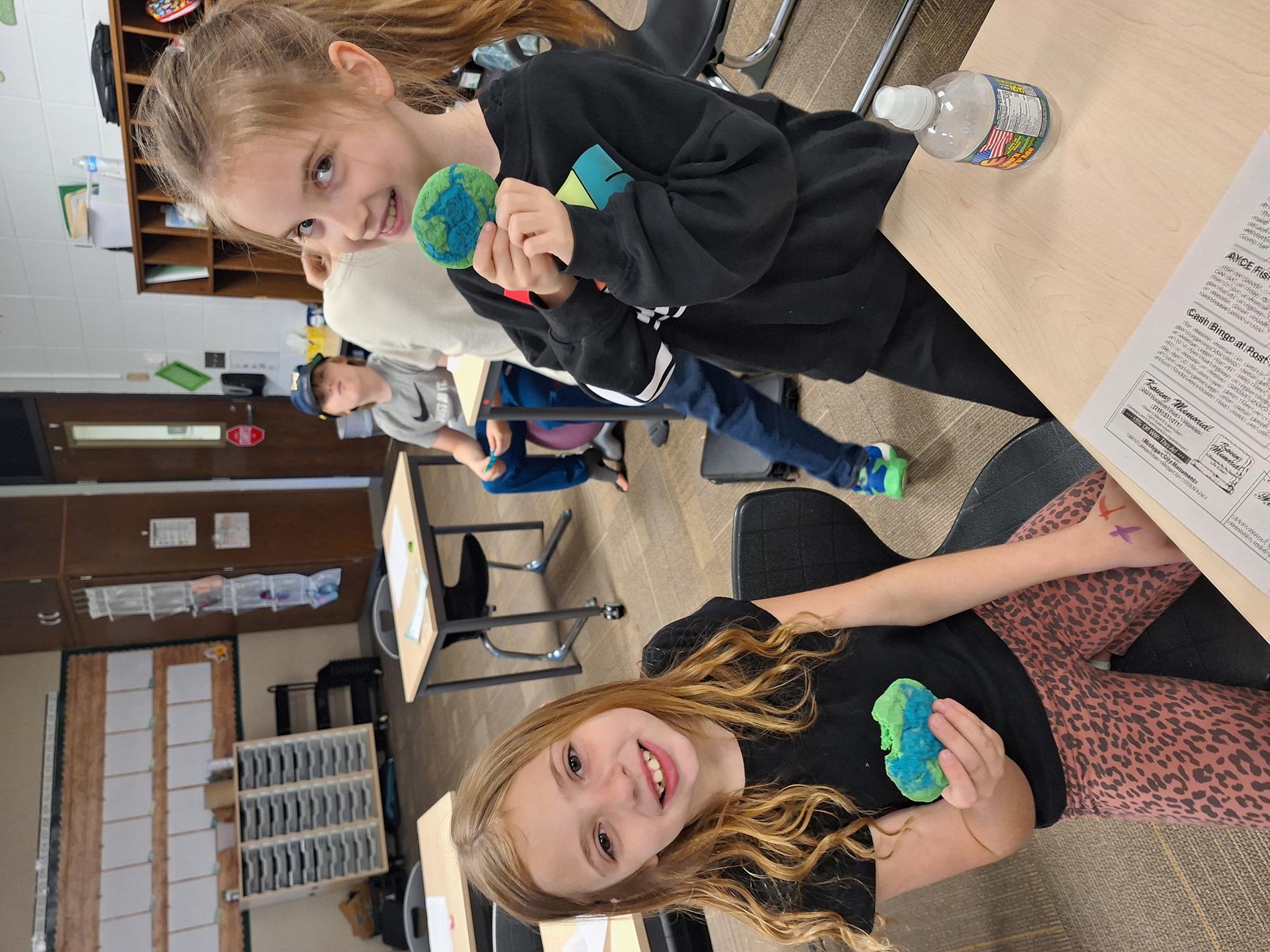 Students enjoying their Earth Day cookies.