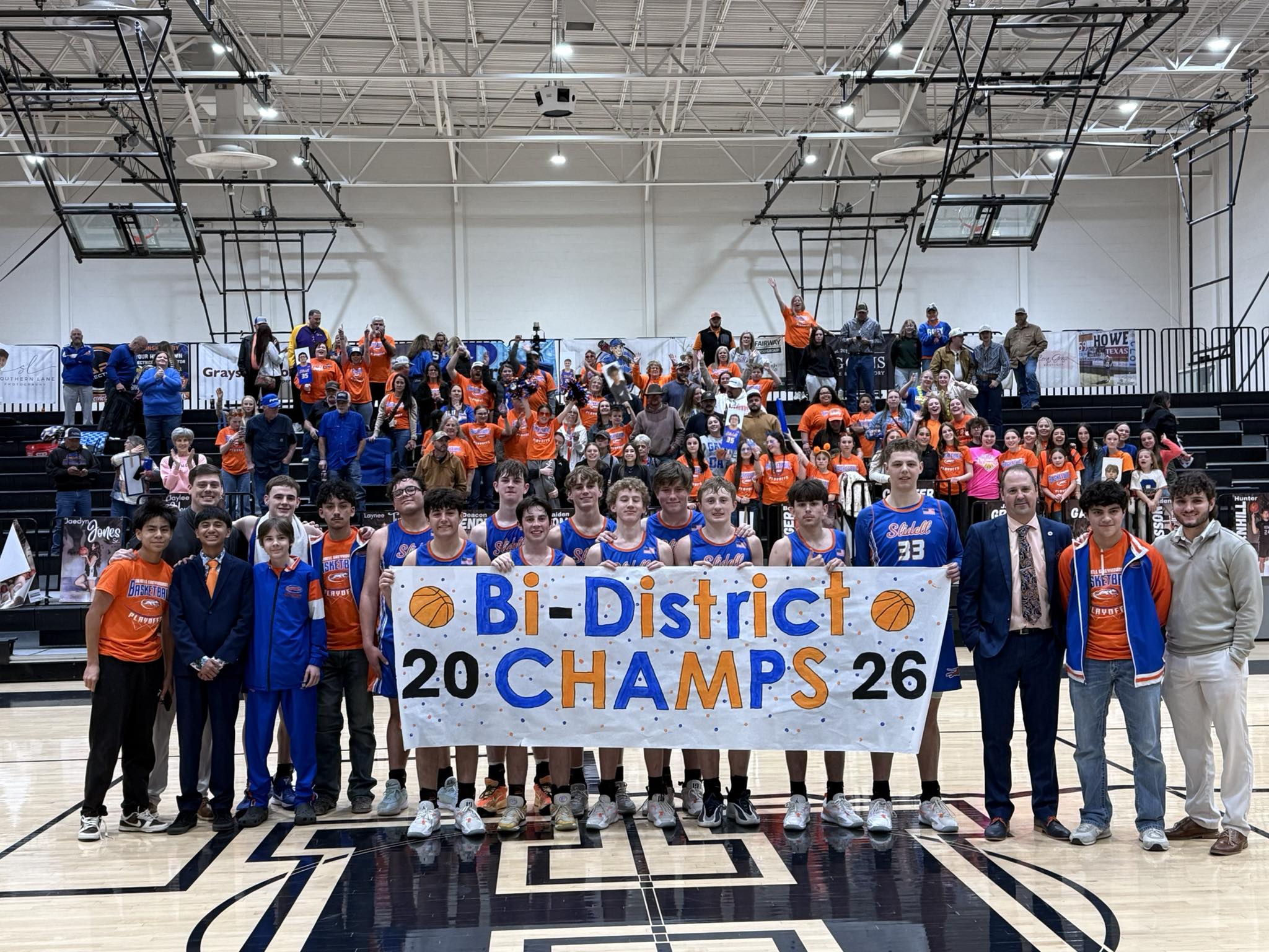 Boys Basketball bi district champs! 