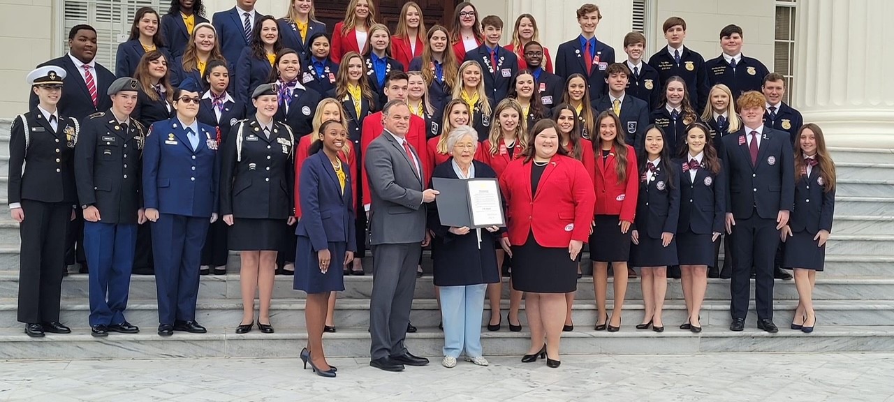 All Career Technical Student Organizations to include JROTC CTSO Officers, Alabama Assistant State Superintendent Dr. Jimmy Hull and Governor Kay Ivey pose for a group photo on the steps of Alabama State Capitol for CTE on the Hill in Montgomery, AL.