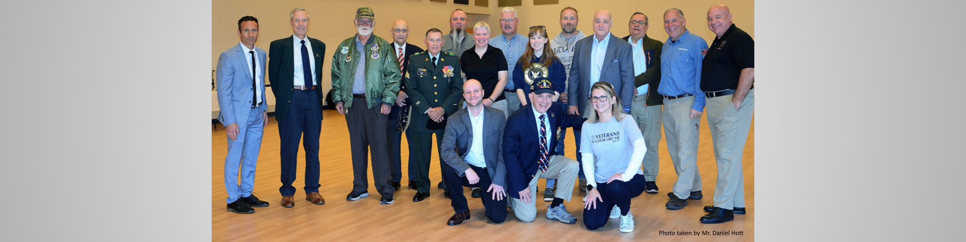 Staff and Veterans pose for a group photo
