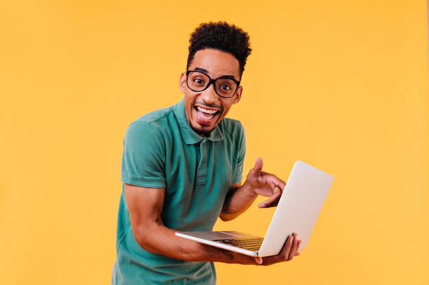 Excited guy with a computer