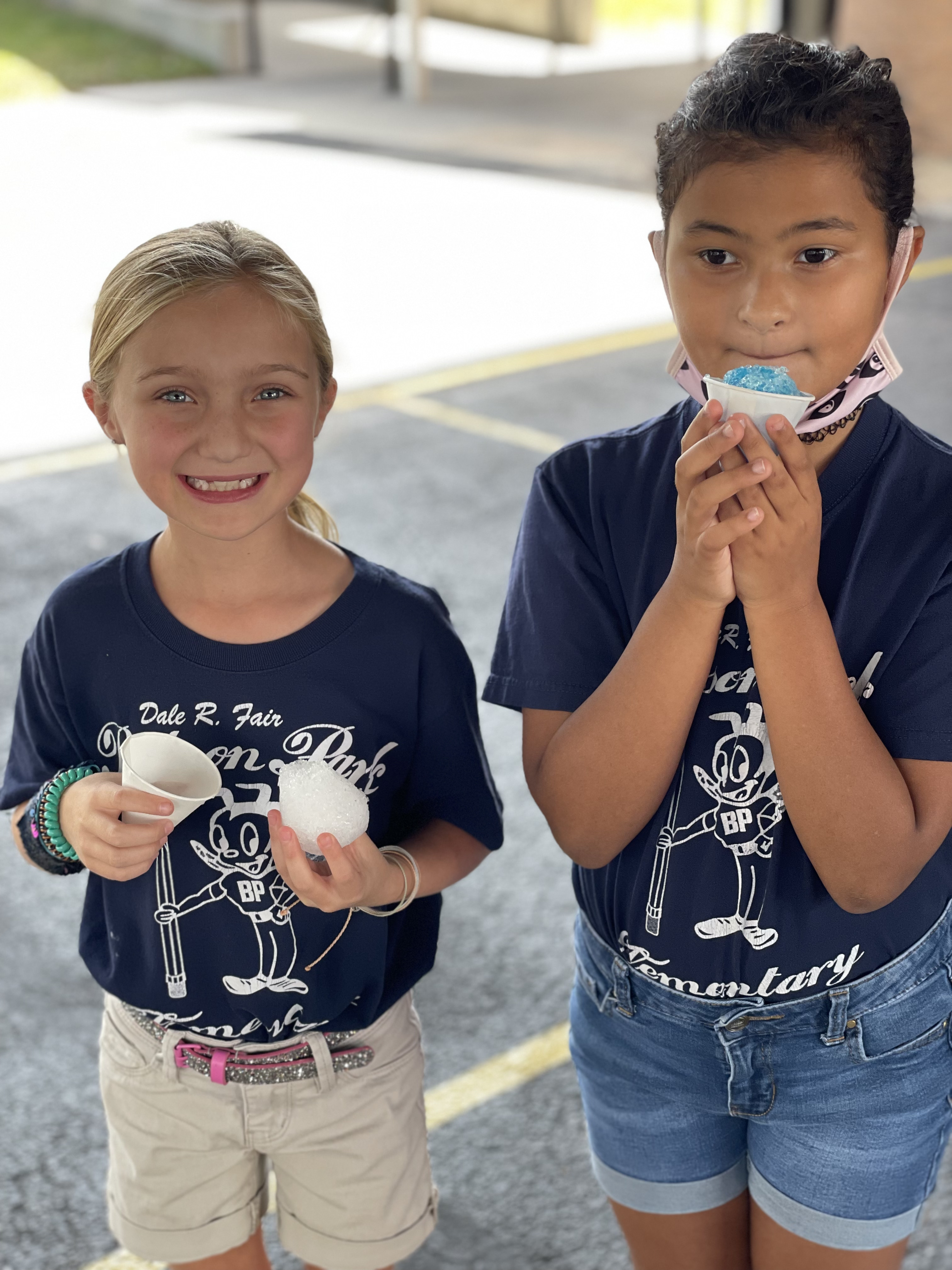 Students eating a snow cone