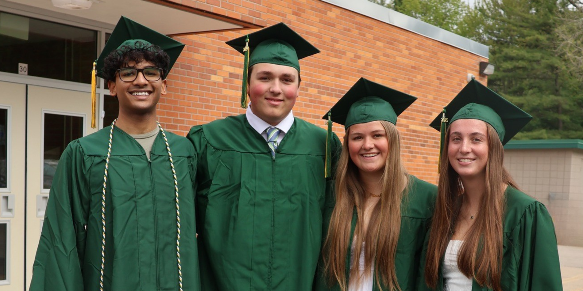 Photo of Dow High graduates posing for a photo