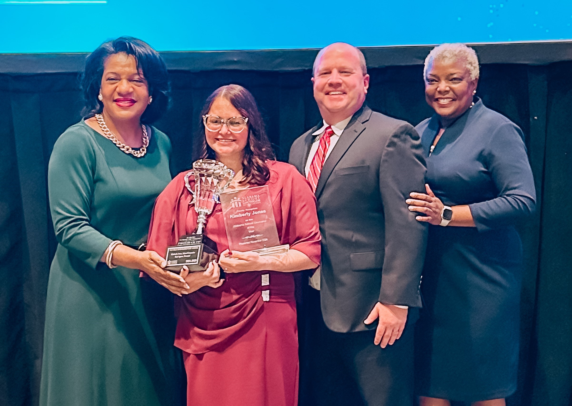 From left are Dr. Monica Motley, Kimberly Jones, Paul Agnew and Dr. Kimberly Walker at the awards ceremony.