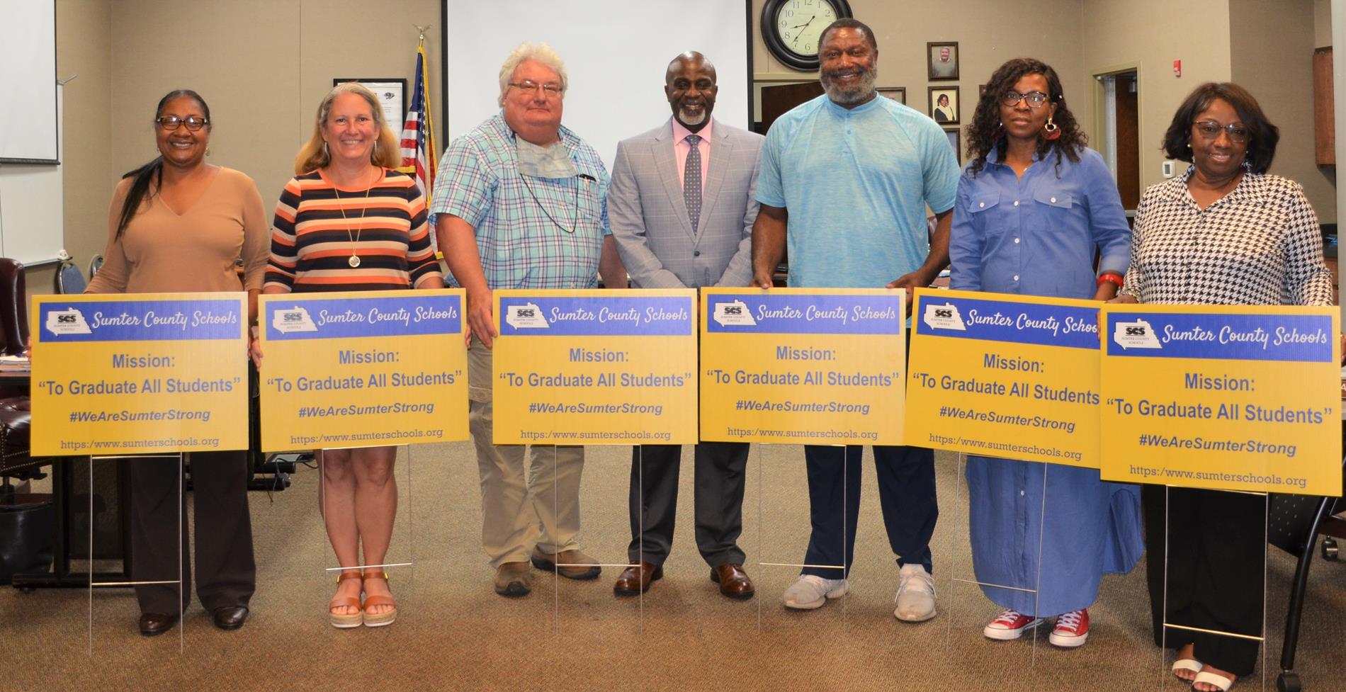 School Board Members Receive Yard Signs