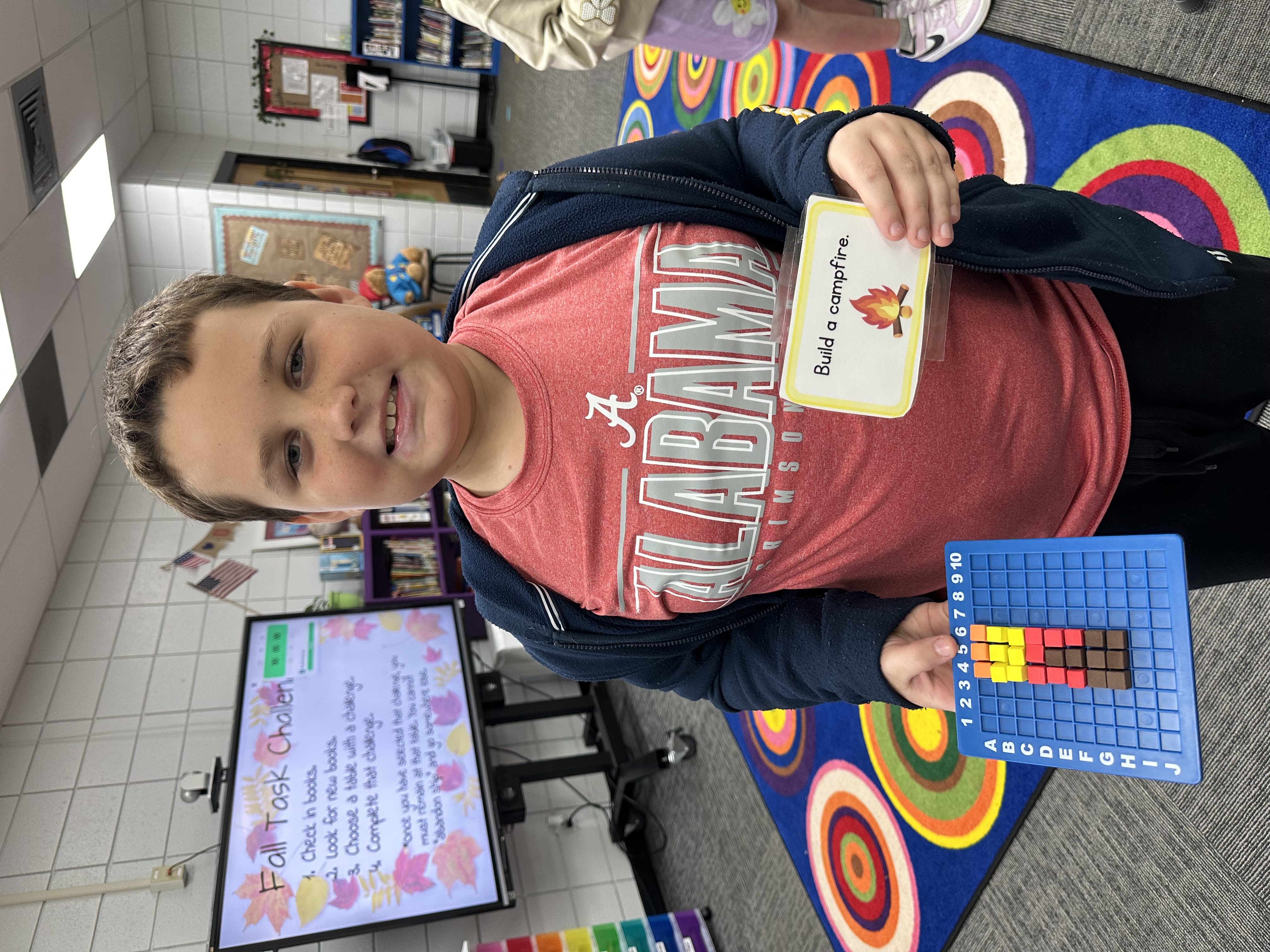 Student completed a building challenge and created a campfire using pixel art.