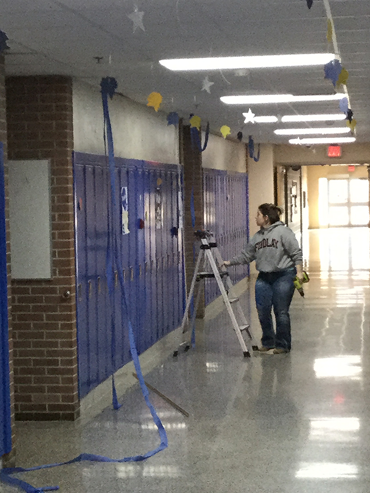 Ms. Adam prepping walls