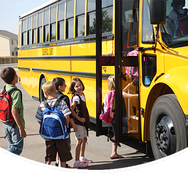 Kids boarding a school bus