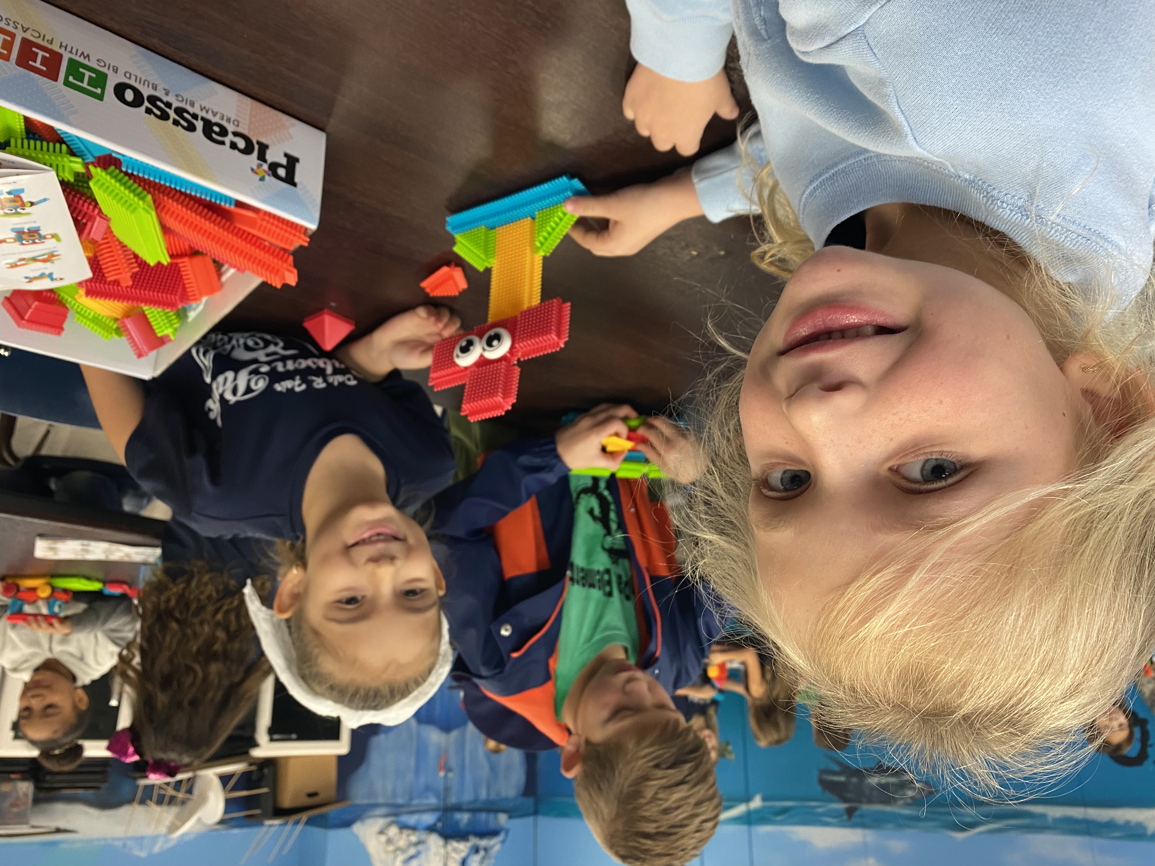 Kindergarten students exploring how to be an engineer with Bristle toys.
