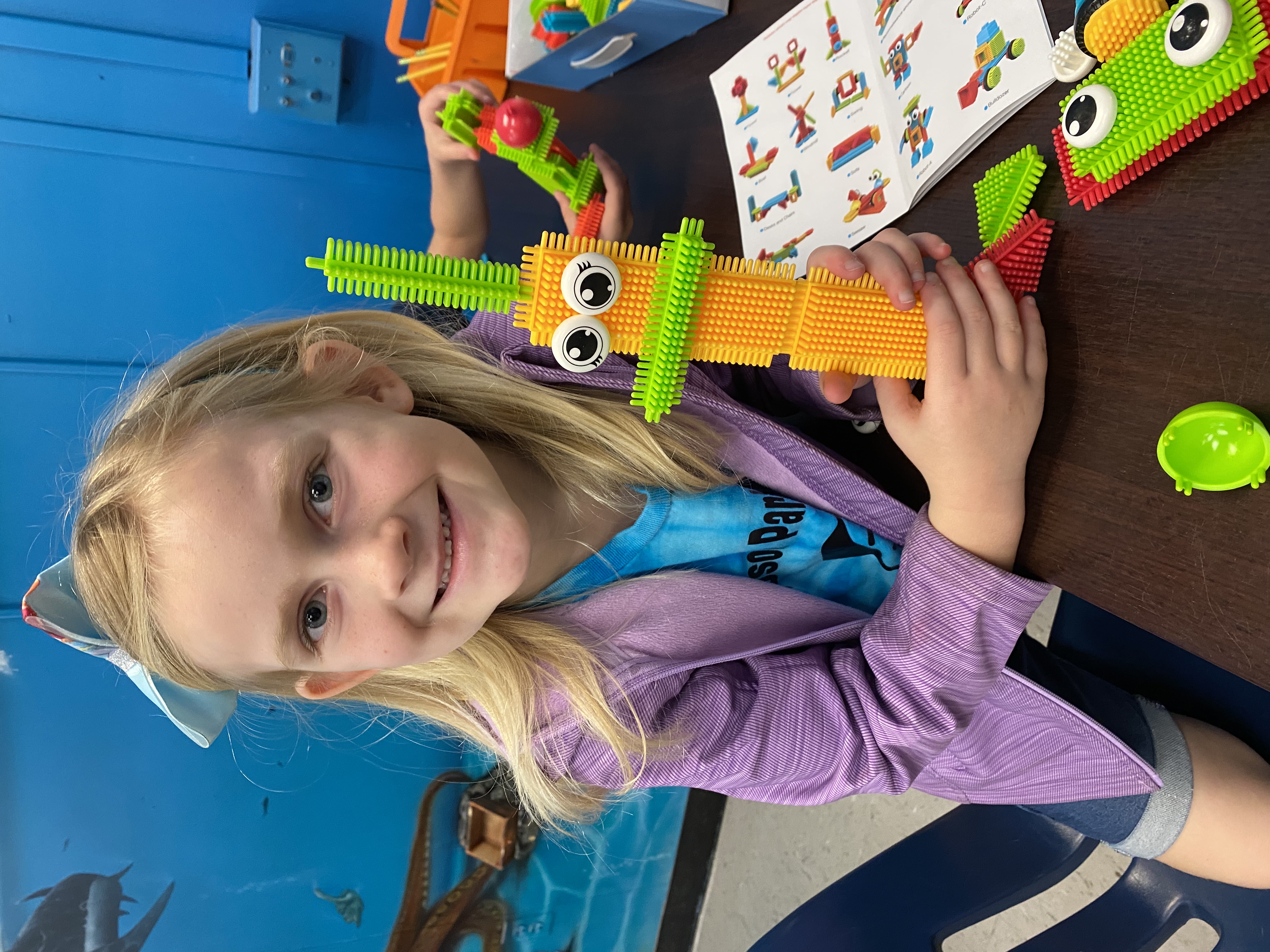 Kindergarten students exploring how to be an engineer with Bristle toys.