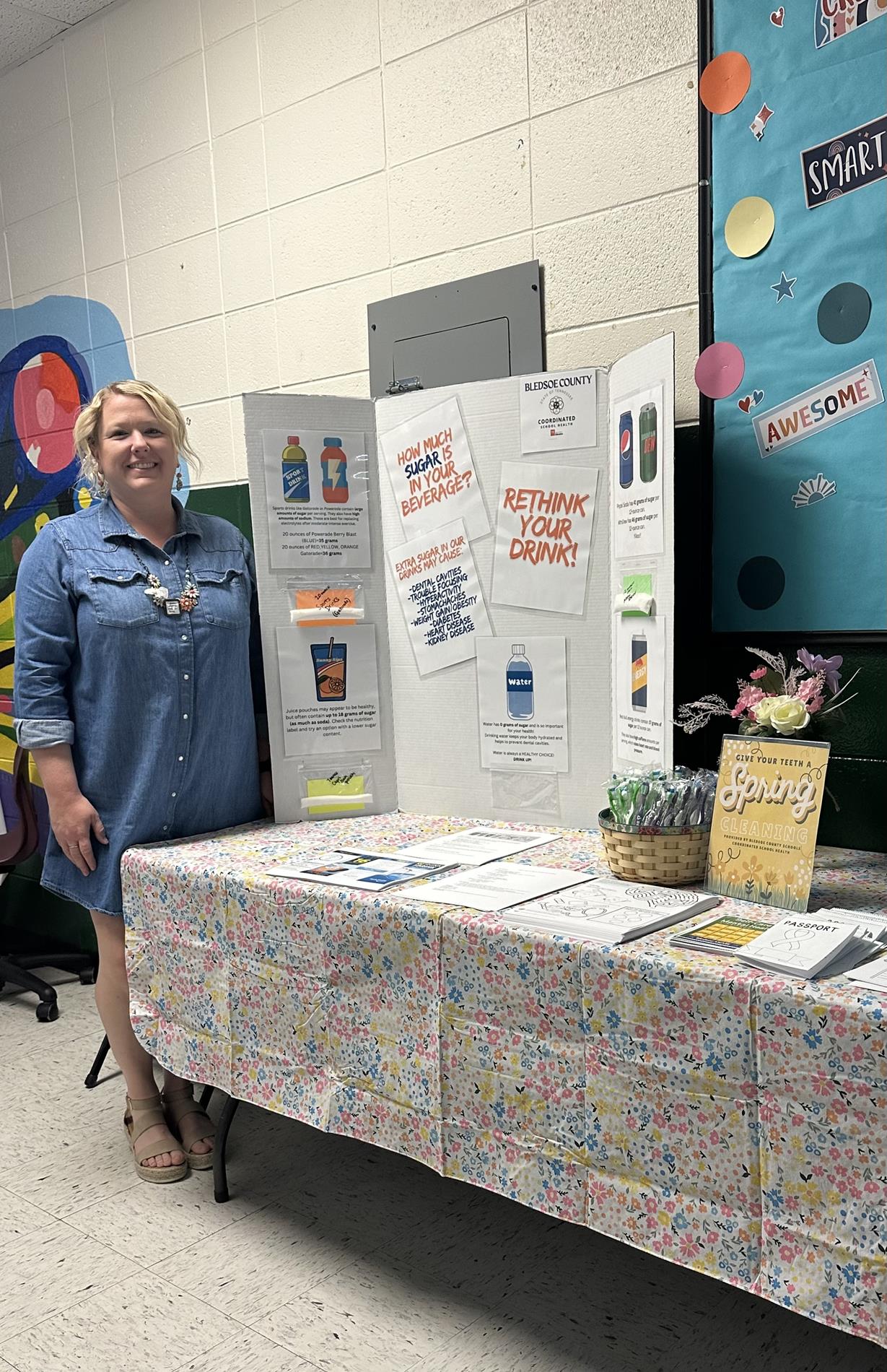 TEACHING STUDENTS AND FAMILIES ABOUT THE SUGAR AMOUNTS IN COMMON DRINKS AND DENTAL HYGIENE. 