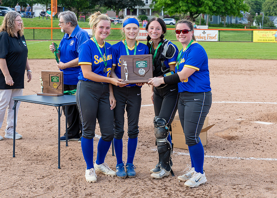 receiving the trophy