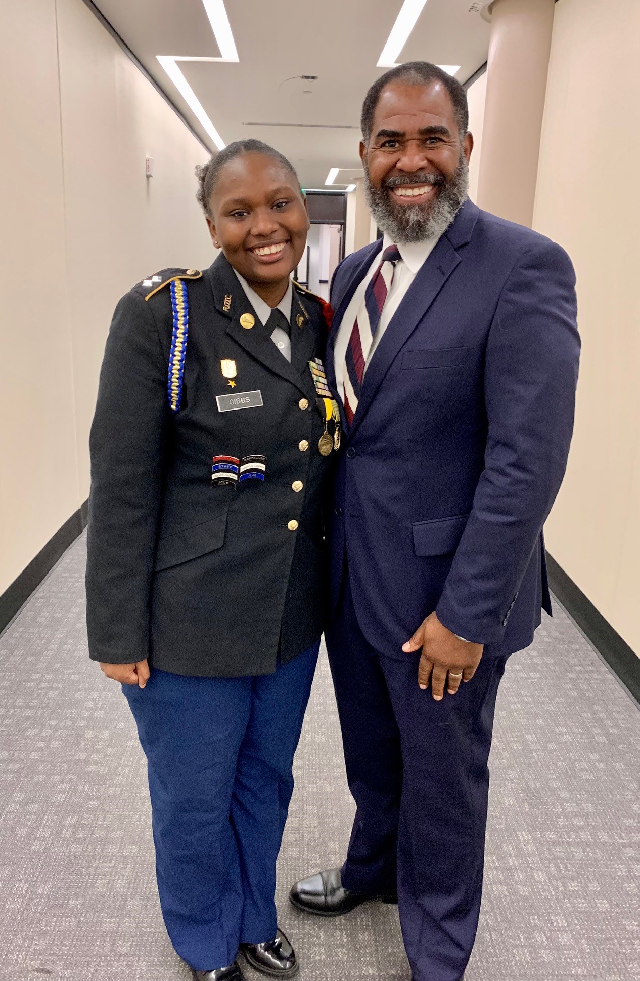 Cadet Lt. Col. Timberly Gibbs, Battalion Commander, Murphy JROTC greets Craig Collins, Alabama State, Education Administrator for CTE during activities for CTE on the Hill in Montgomery, AL.