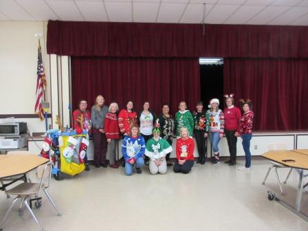 Staff in ugly sweaters