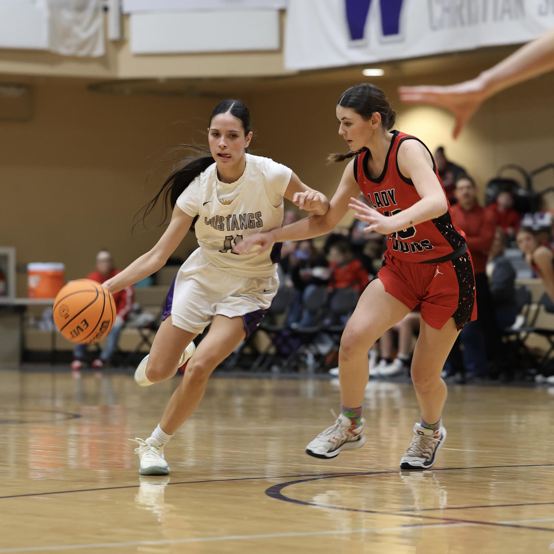 Student Playing Basketball