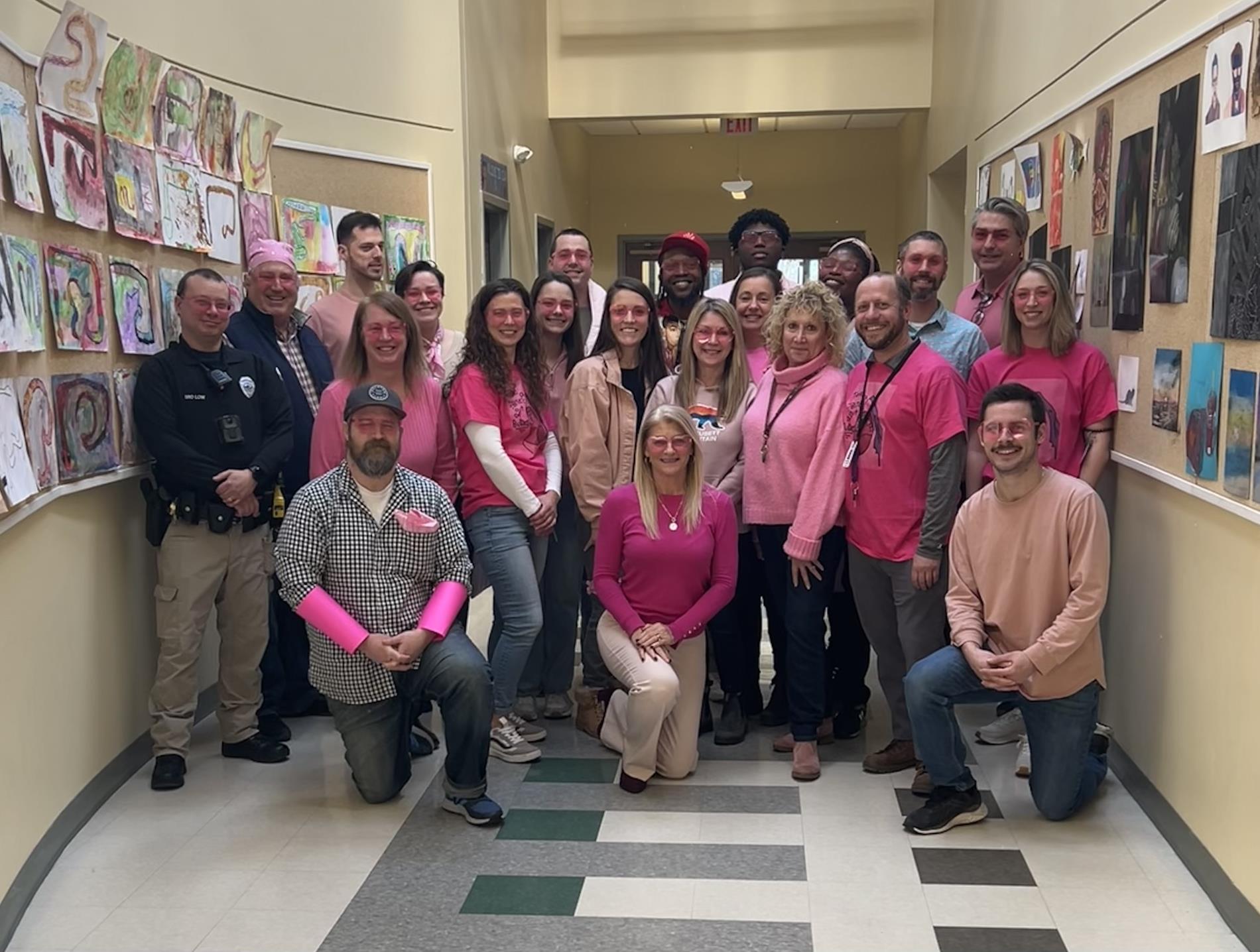 Picture of staff wearing pink shirts