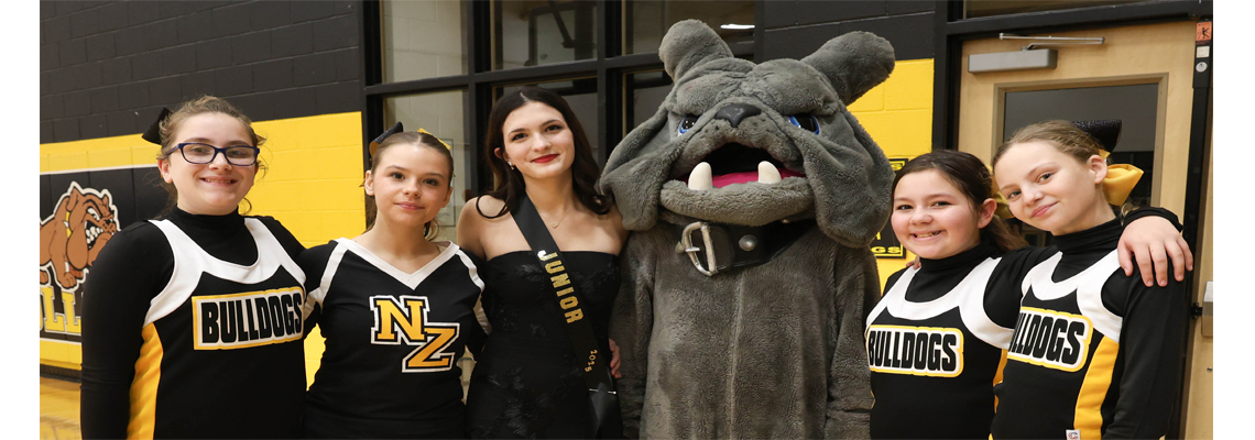 Cheerleaders, mascot and homecoming princess