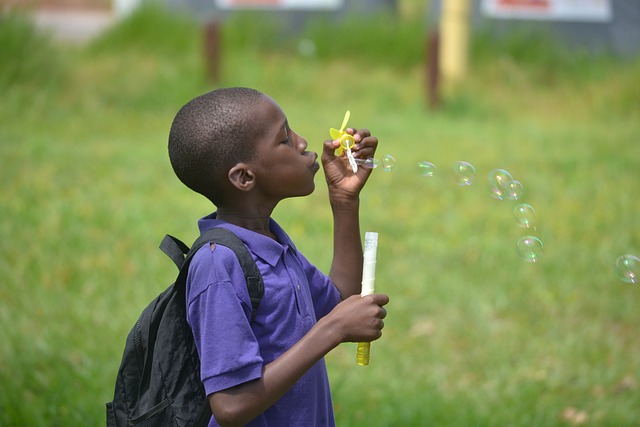 Child blowing bubbles