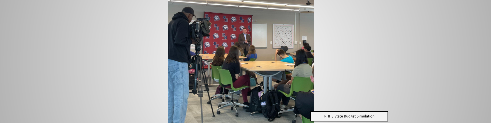 Students participate in a state budget simulation