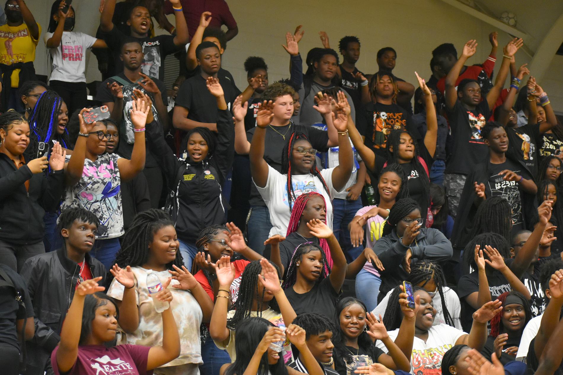 A crowd of students enjoy a pep rally.