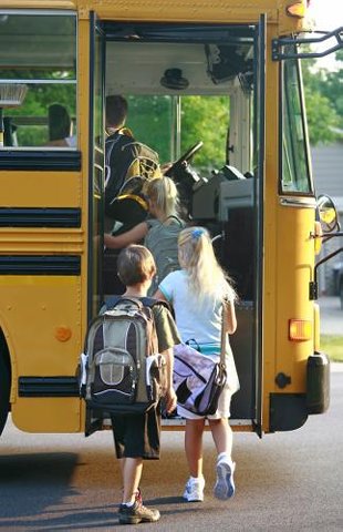 kids loading on bus