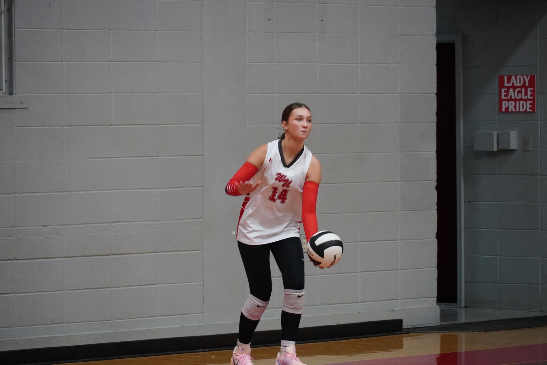 Girl Serving in Volleyball