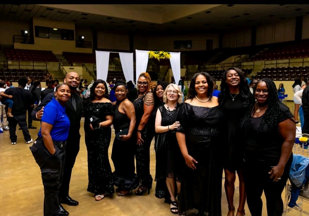 Members of the CBES staff dressed up at the coronation.
