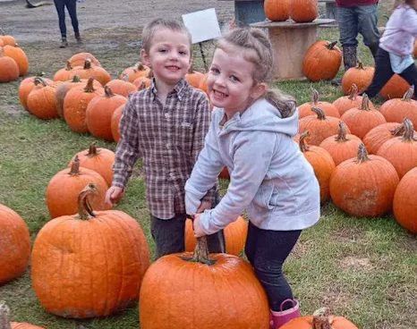 children and pumpkins children and pumpkins