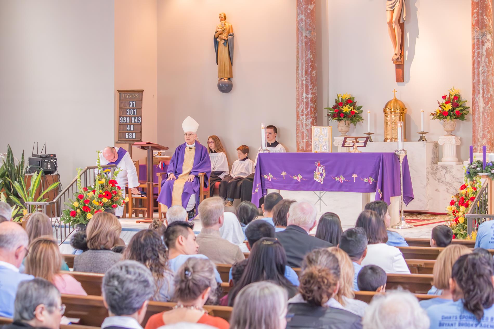 View of celebrants and altar
