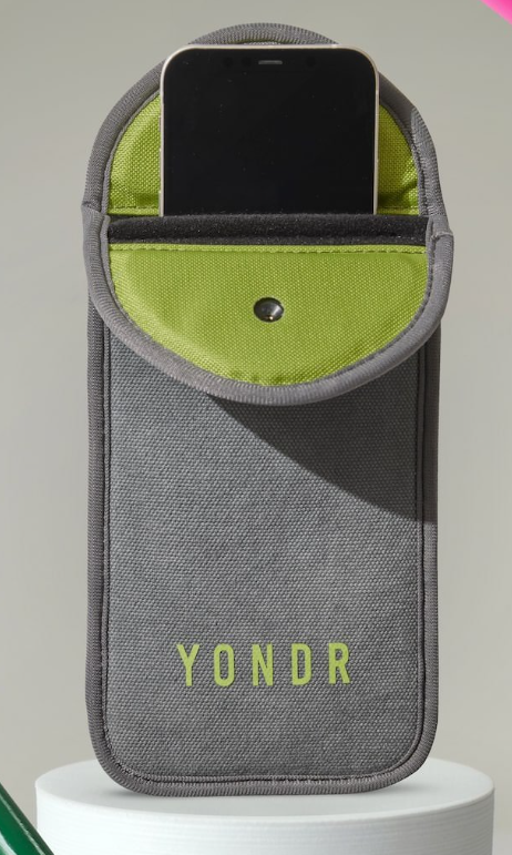 yondr pouch image small green bag with magnet at the top where it closes