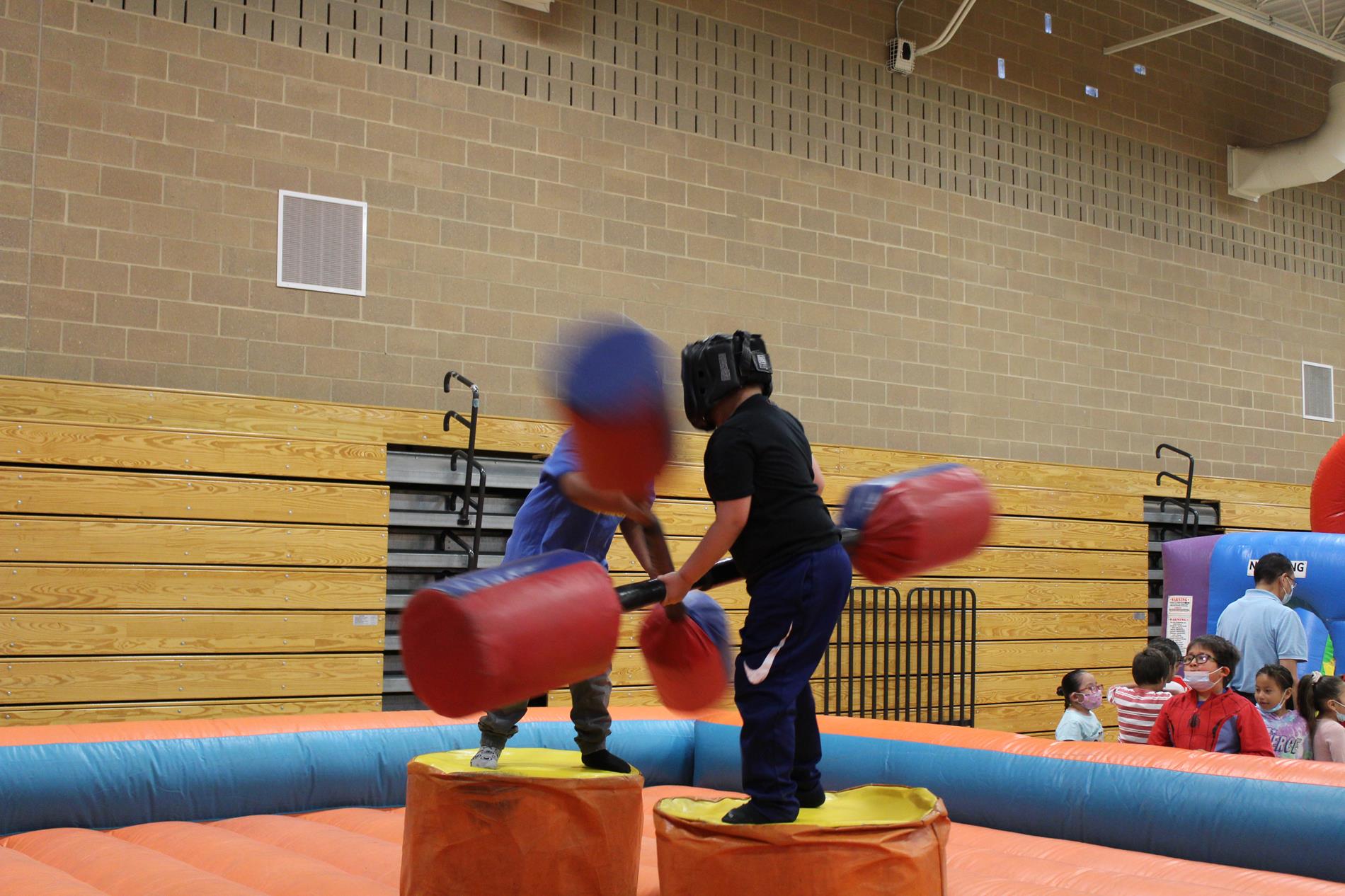 2 students jousting