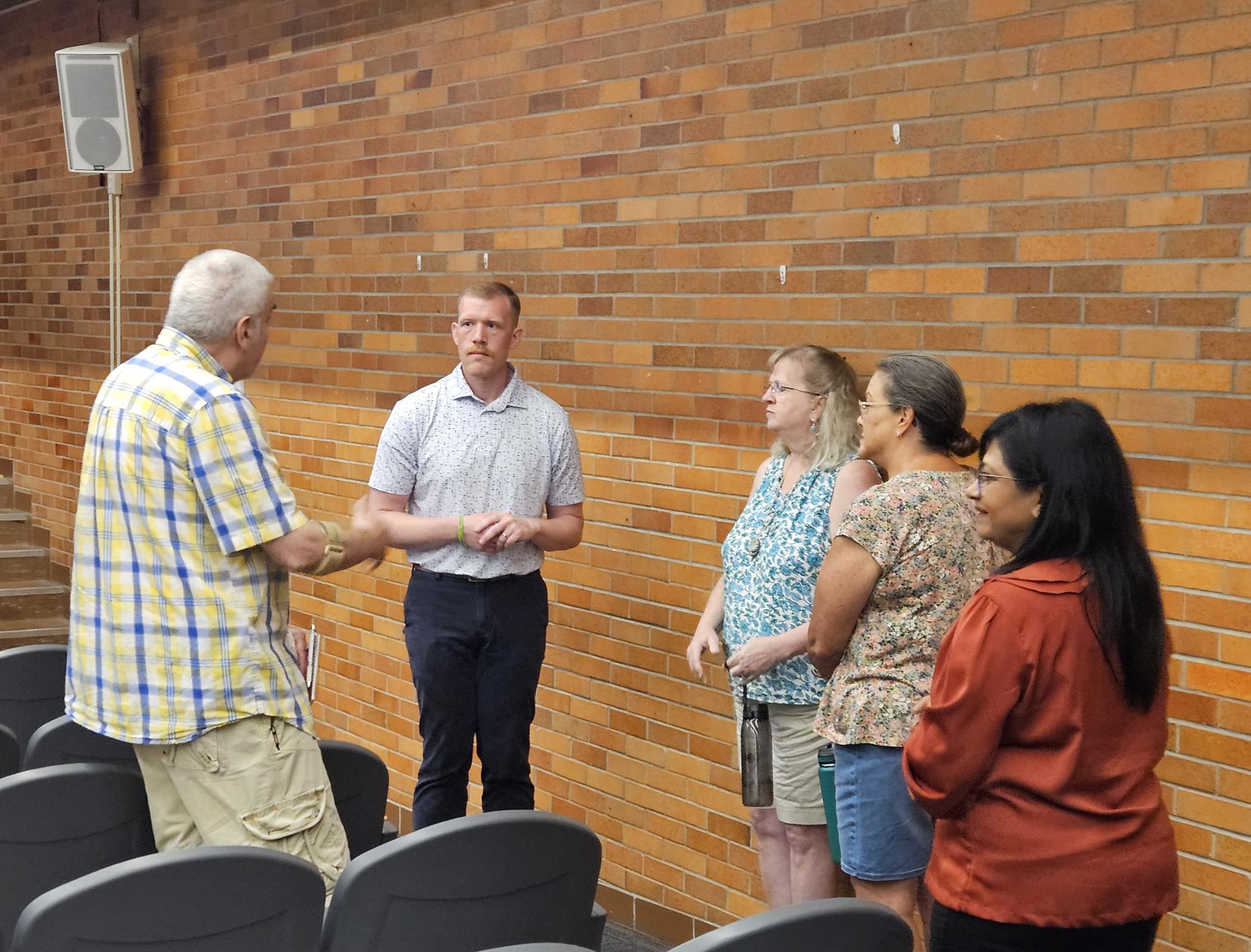 Attendees chat with Steven Gunther of GMB about the presentation