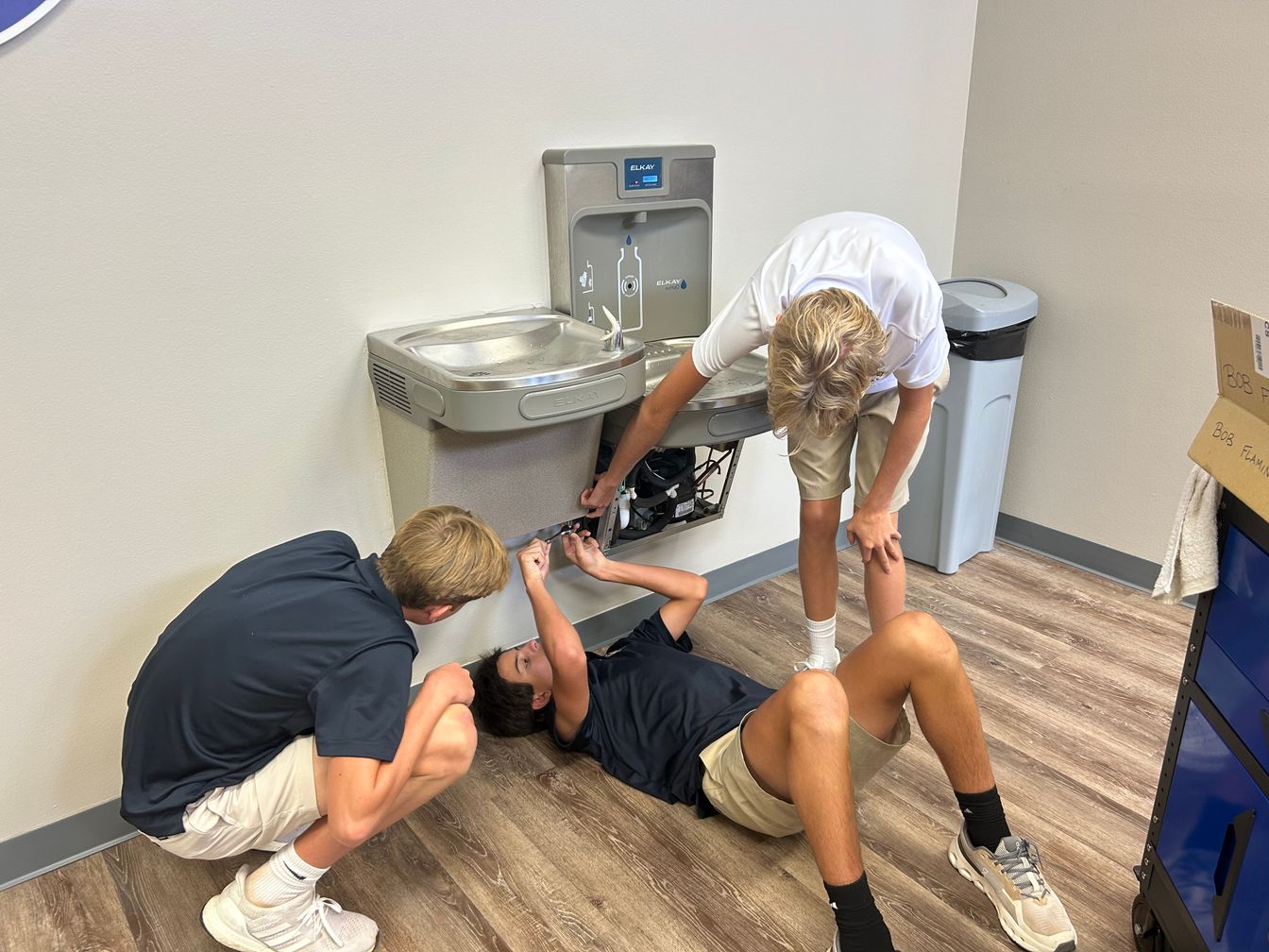 Students working on water fountain 