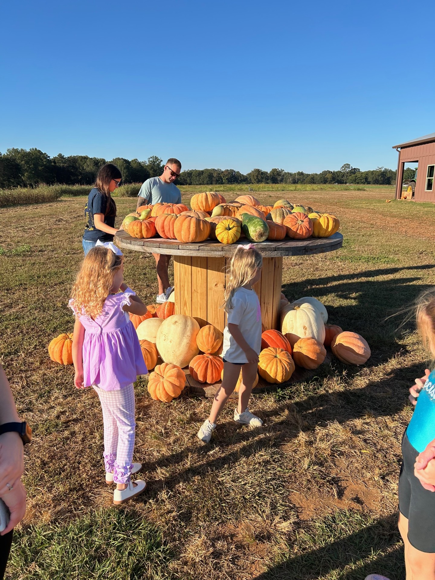 Family at the Pumpkin Patch at Arena Acres